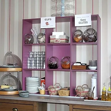 Restaurant Le Grillon Hotell